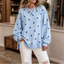 Women's Polka Dot Sweatshirt with Crisscross Ribbon Tie Neckline in light blue
