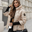 Women's quilted hooded puffer jacket with faux fur trim in beige