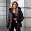 Women's quilted hooded puffer jacket with faux fur trim in purple