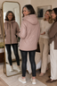 Hooded quilted jacket worn outdoors