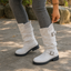 Slouch boots worn on an autumn walk