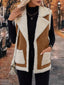 Rust vest styled with black trousers