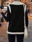 Black vest shown from the side