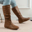 Light brown slouch boots shown from the side