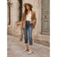 Slouch boots styled with a hat and coat