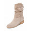 Mid calf slouch boot shown against a plain background