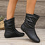 Black slouch boots shown from the side