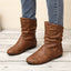 Coffee brown slouch boots shown from the side