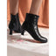 Women's vintage button up heeled ankle boots in black