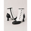 Two tone button boots shown as a pair