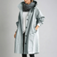 Women's lightweight water resistant hooded rain coat in soft blue
