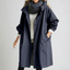 Women's lightweight water resistant hooded rain coat in dark blue