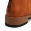 Lugged rubber outsole of the combat boots