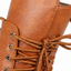 Wrap lacing detail of the mid calf boots